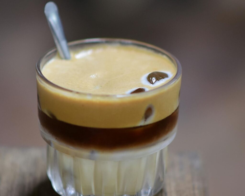 Close-up of Vietnamese Egg Coffee on a Wooden Table